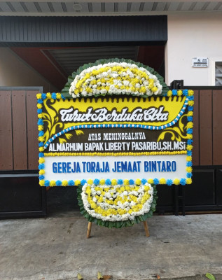 Papan Bunga Duka di Kayawu